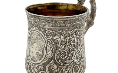 A MINIATURE SILVER TANKARD WITH EXTENSIVE EMBOSSED DECORATION, FRENCH,...
