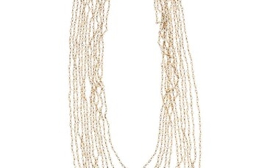 A MULTI STRAND PEARL NECKLACE; 12 strands of seed pearls to silver gilt chain and clasp, 42cm.