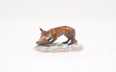 A Meissen figure of a fox with a chicken in...