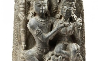 A NORTH INDIAN SANDSTONE CARVING OF SHIVA AND...