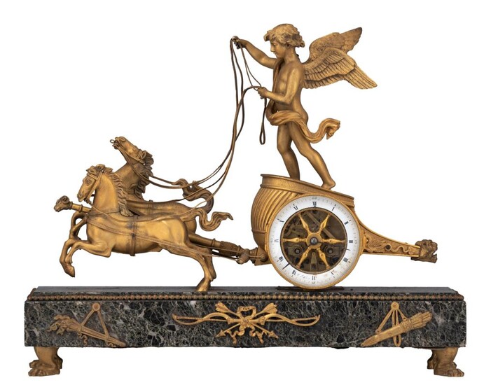 A Neoclassical mantle clock with Cupid's chariot, H 46 - W 37 cm