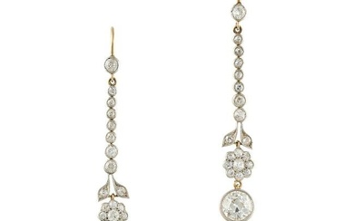 A PAIR OF DIAMOND DROP EARRINGS in yellow and white gold, each earring designed as a drop of old cut