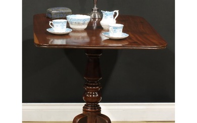 A Regency mahogany tripod supper table, rounded rectangular ...