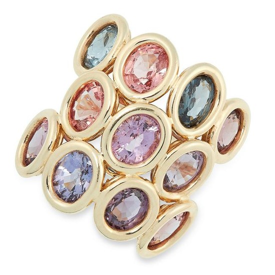 A SPINEL DRESS RING set with multicoloured oval cut