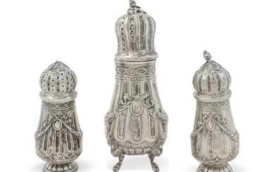 A Set of Three German Silver Casters Heights 7 1/2 and