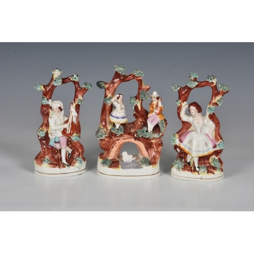 A Staffordshire figural group, mid 19th century, of a couple...