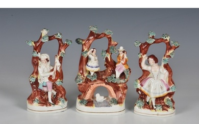 A Staffordshire figural group, mid 19th century, of a couple...