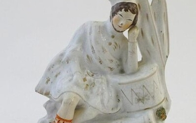A Staffordshire pottery flat back figure depicting a