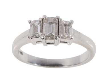 A THREE STONE DIAMOND RING three baguette-cut diamonds, the ...