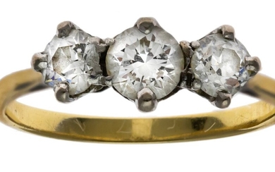 A Three Stone Diamond Ring Diamonds bright and lively. Band unmarked.