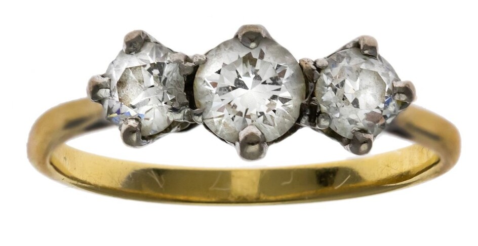 A Three Stone Diamond Ring Diamonds bright and lively. Band unmarked.