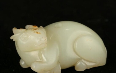A WHITE JADE 'BEAST' CARVING