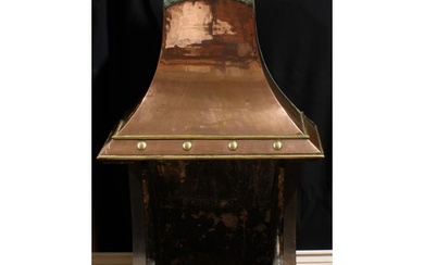 A cast iron, brass and copper fireplace, cast iron basket, b...