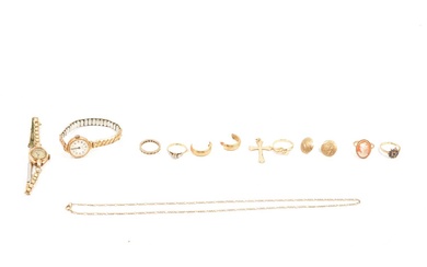 A collection of gold jewellery, crucifix, cross, rings and earrings.