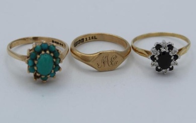 A group of three 9ct gold rings, a sapphire and...