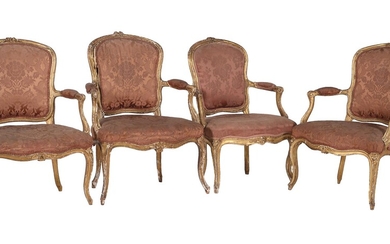 A harlequin set of four Louis XV giltwood and upholstered fauteuils