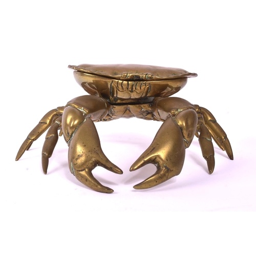 A large 19th century Victorian brass inkwell cast in the for...