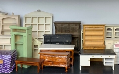 A large quantity of dolls house living room wooden furniture items.