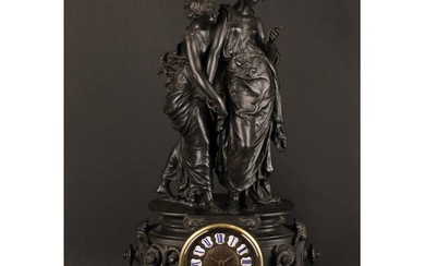A late 19th century French spelter figural mantel clock, 9.5...