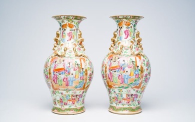 A pair of Chinese Canton famille rose vases with palace scenes, floral design and antiquities, 19th