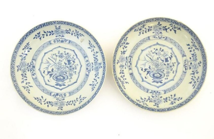 A pair of Chinese blue and white plates with central