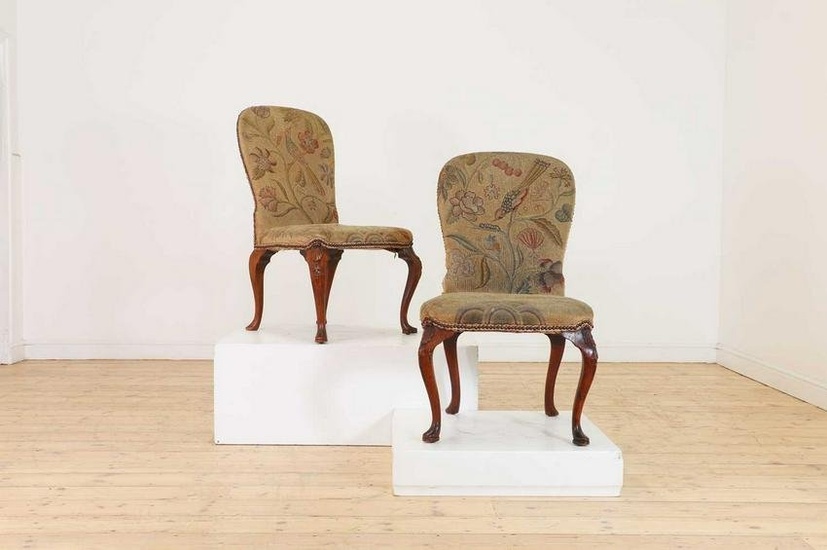A pair of George I walnut side chairs