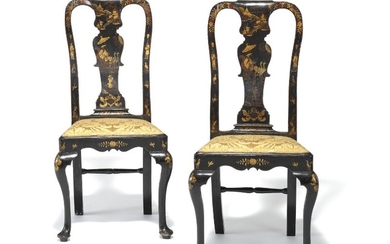 A pair of George II black lacquer and gold japanned side chairs, each with arched backs, drop-in seats and cabriole legs. Mid-18th century. (2)