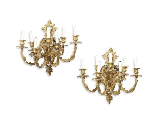 A pair of Louis XV style gilt bronze wall lights