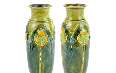 A pair of Royal Doulton stoneware vases. Height 25cm. (2)