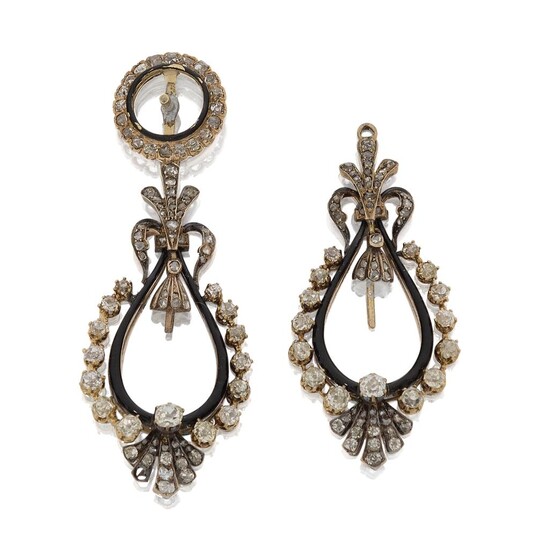 A pair of diamond and enamel ear pendant mounts, each designed as an old-brilliant-cut diamond pear-shaped garland design drop (central drops deficient) with black enamel line detail, one with matching circular suspension, the other deficient...