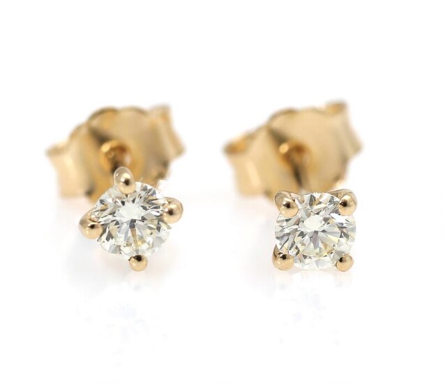 SOLD. A pair of diamond ear studs each set with a diamond weighing a total of app. 0.40 ct., mounted in 14k gold. (2) – Bruun Rasmussen Auctioneers of Fine Art