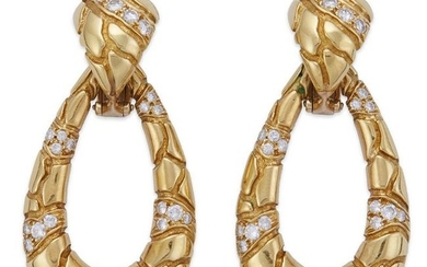 A pair of eighteen karat gold and diamond earrings