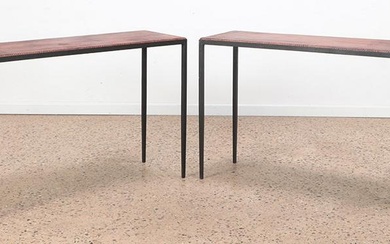 A pair of iron and leather console tables in the manner of Jean-Michel Frank. Ht: 29" Wd: 43" Dpth