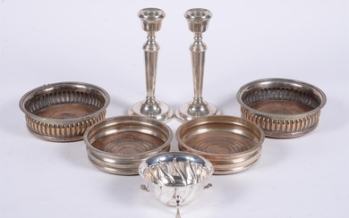A pair of silver candlesticks by A. T. Cannon Ltd.