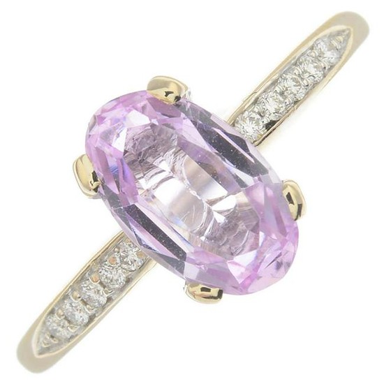 A pink topaz and brilliant-cut diamond ring.Topaz
