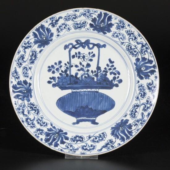 A porcelain plate with decoration of a vase with flowers, China, Kangxi.
