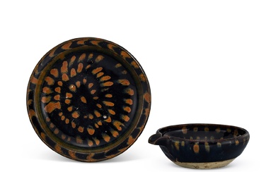 A russet-splashed black-glazed dish and pouring vessel, yi, Song - Yuan dynasty 宋至元 黑釉鏽斑折沿盤 及 匜一組兩件