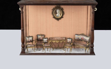 A set of early 20th century Viennese enamel and gilt metal dolls’ house furniture