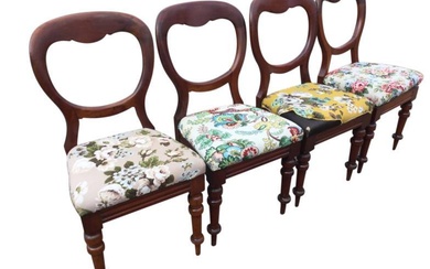 A set of four Victorian mahogany baloonback dining chairs...