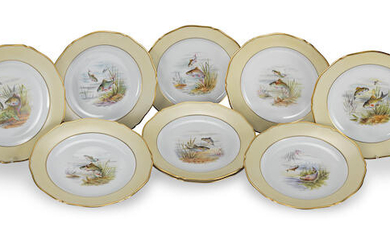 A set of nine Limoges dinner plates