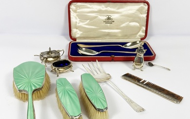 A small group of silver items, including a silver a green enamel backed three brush set; a silver