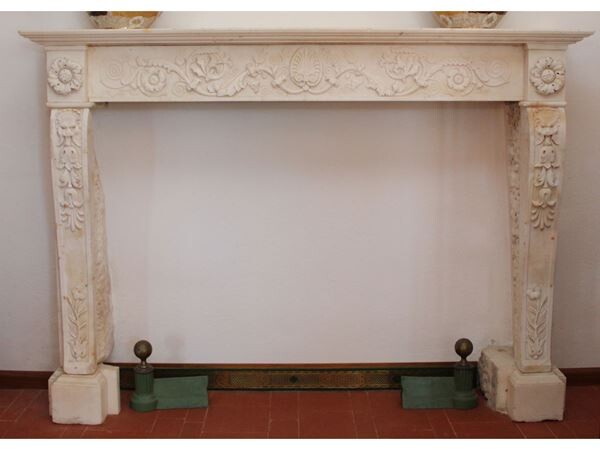 A white Carrara marlbe fireplace late 19th/erly 20th century