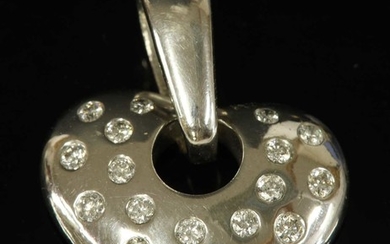 A white gold diamond heart pendant