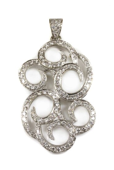 A white gold diamond set scrolling pendant