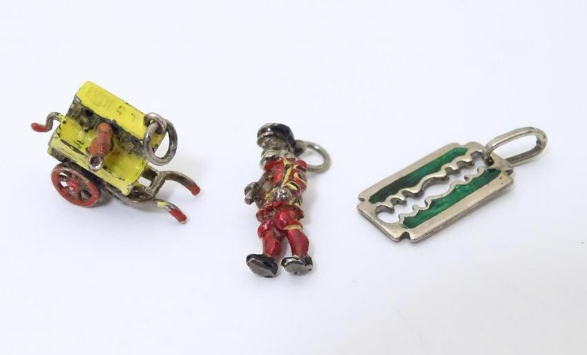 A white metal pendant charm formed as a Beefeater with