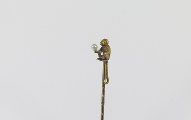 AN OLD PEARL AND GOLD PRIMATE STICK-PIN
