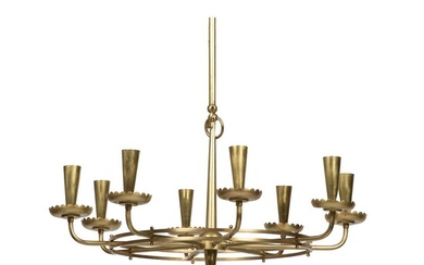ANNÉES 1940 Lustre néoclassique floral à huit lumières, structure en laiton et bronze. A brass and bronze chandelier, with eight...