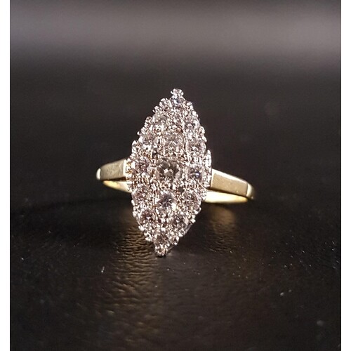 ATTRACTIVE DIAMOND CLUSTER RING the multi diamonds in marqu...