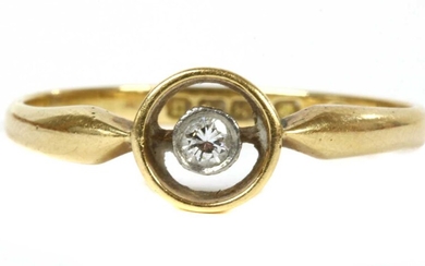An 18ct gold single stone diamond ring, c.1920