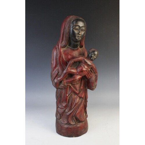 An African wooden fertility carving, 20th century, modelled ...